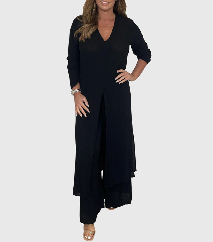 Woman wearing a black dress on a white background