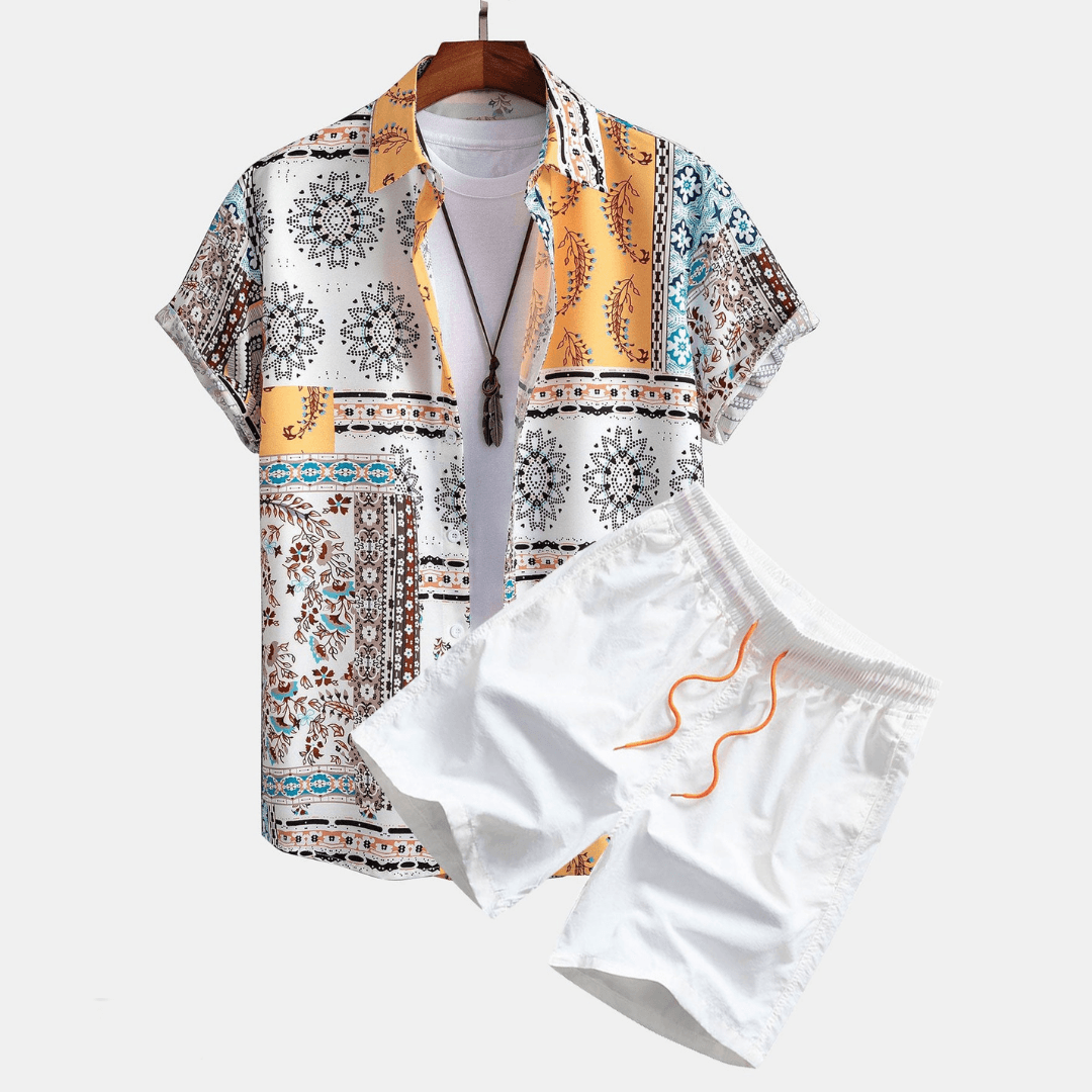 Colorful patterned shirt and white shorts on a hanger against a white background