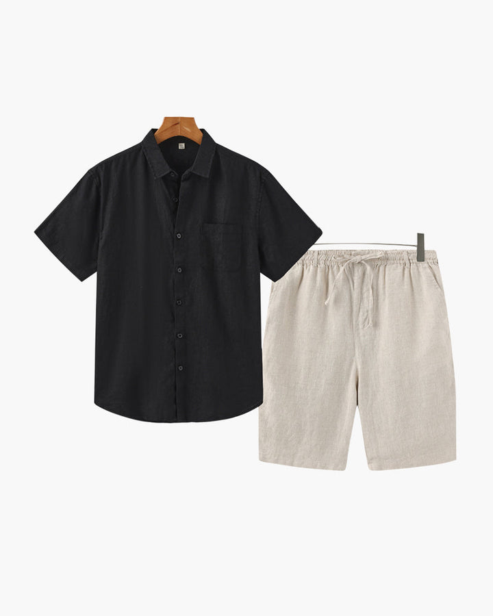 Black short-sleeve shirt and beige shorts on a white background