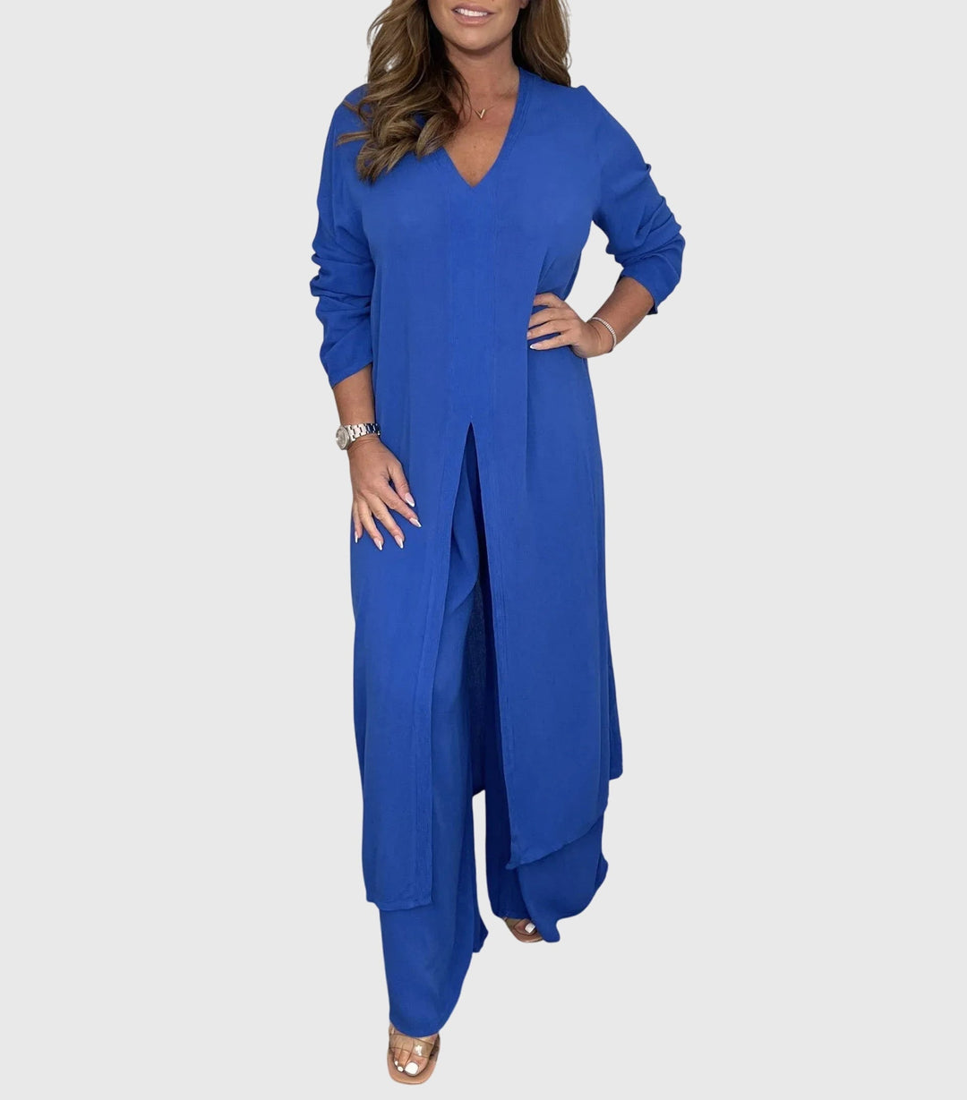 Woman wearing a blue dress on a white background