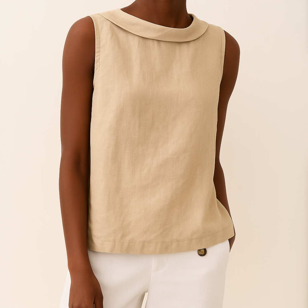 Beige sleeveless top worn by a person on a beige background