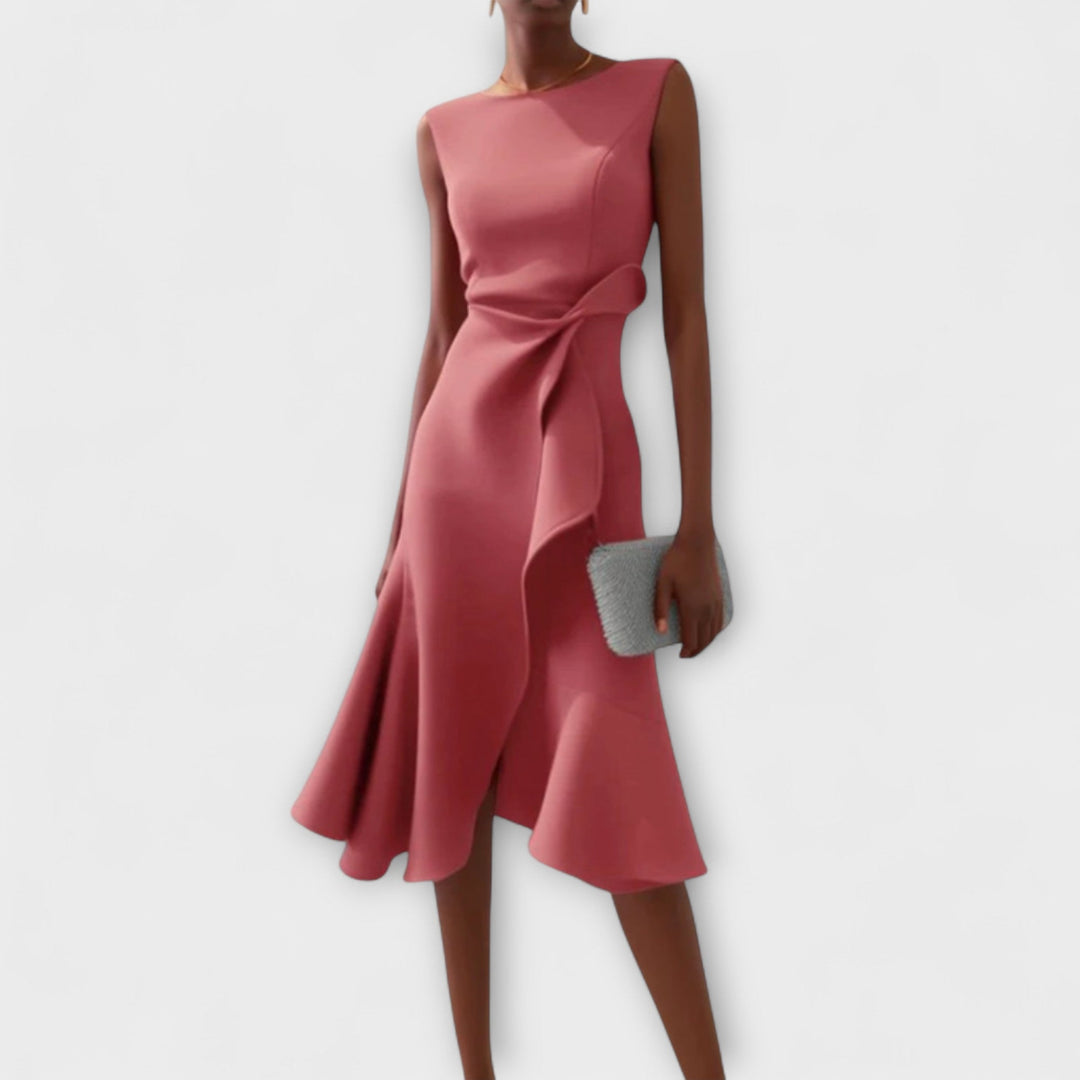Pink dress worn by a person on a white background