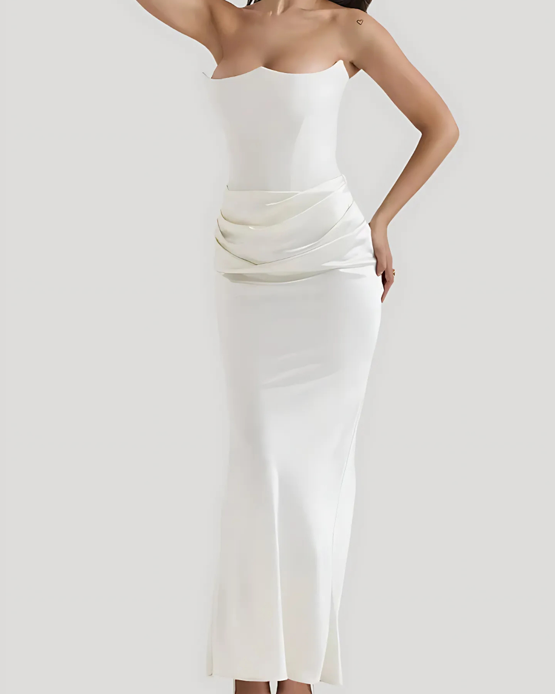 White strapless dress on a plain background