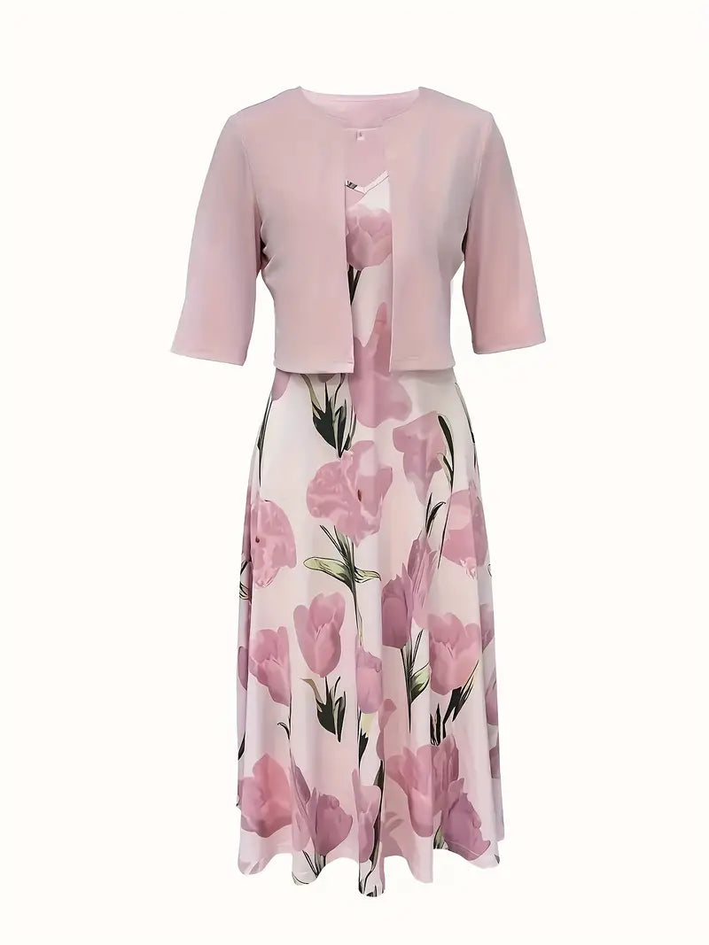 Pink floral dress with matching jacket on a white background