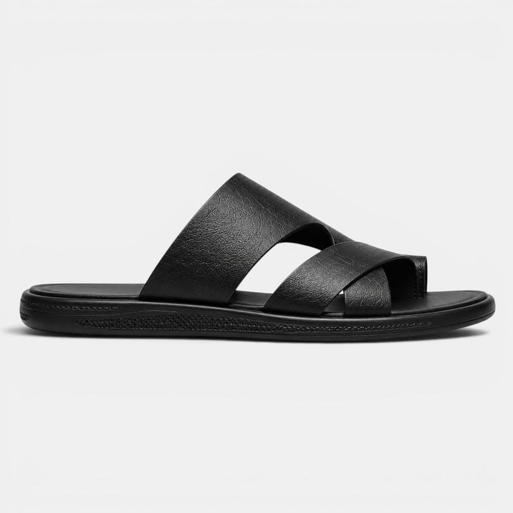 Black sandal on a light gray background
