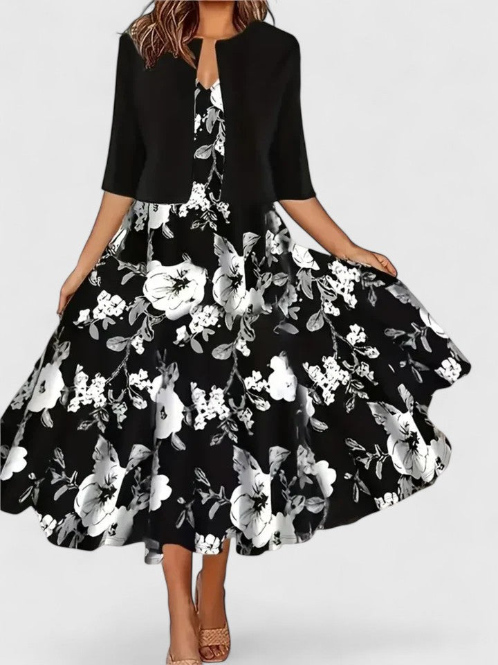 Black floral dress with a matching jacket on a white background