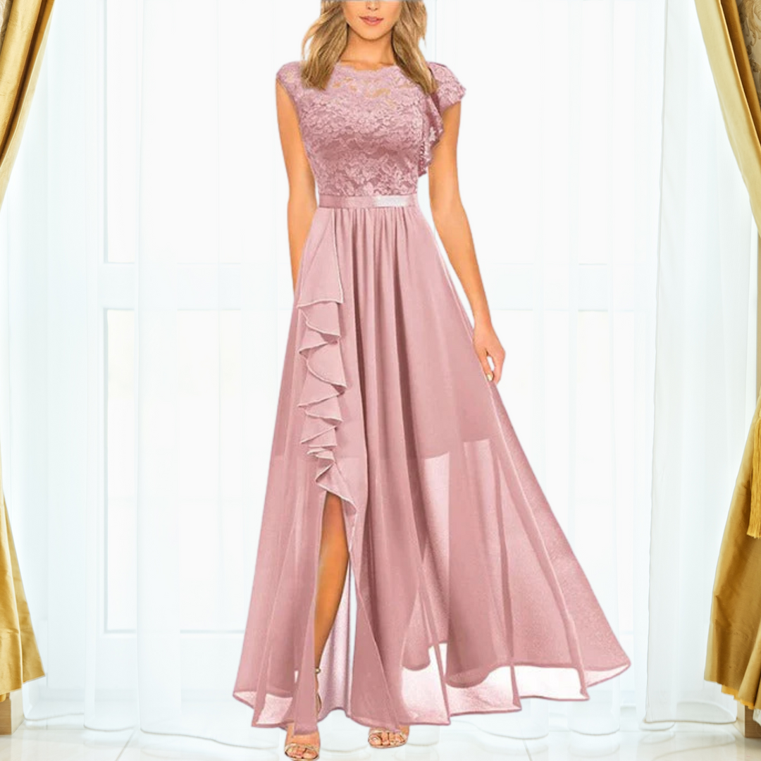 Pink evening gown with lace top and ruffle details on a white background