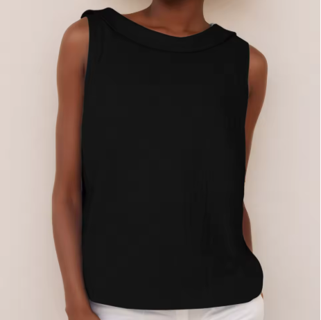 Black sleeveless top worn by a person on a plain background