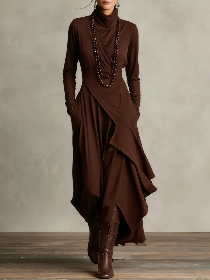 Brown dress with ruffled layers and matching boots on a neutral background