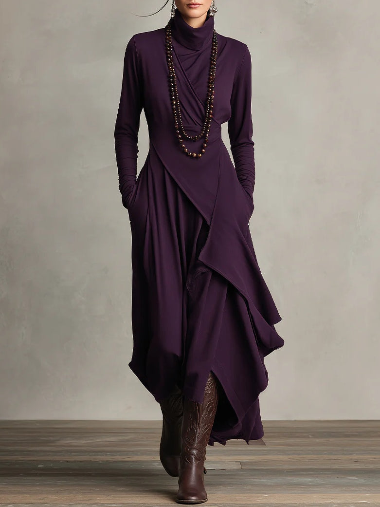 Purple dress with a layered skirt and brown boots on a neutral background