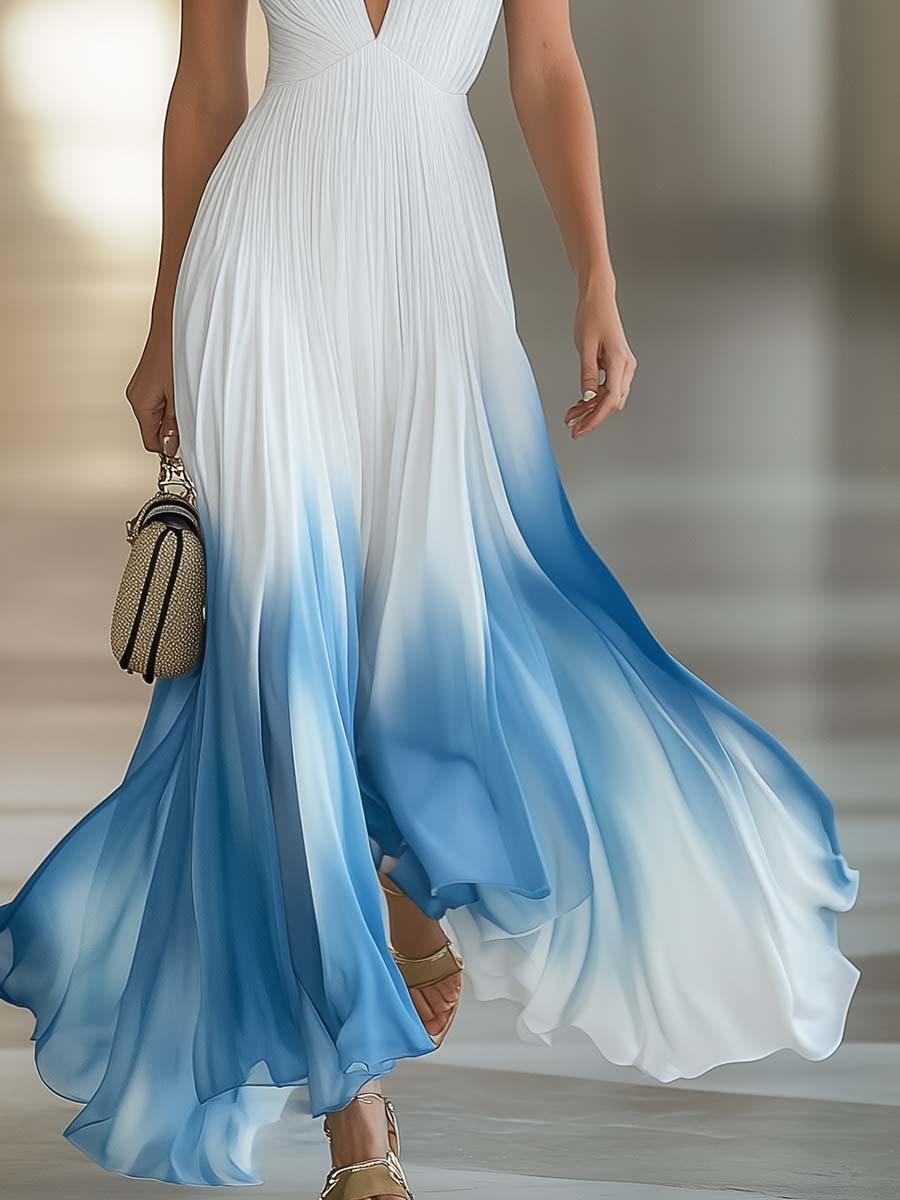Woman wearing a white and blue gradient dress with a blurred background
