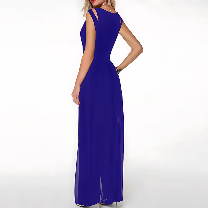 Woman wearing a long blue dress on a white background