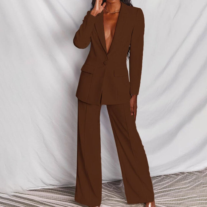 Brown suit worn by a person against a white background